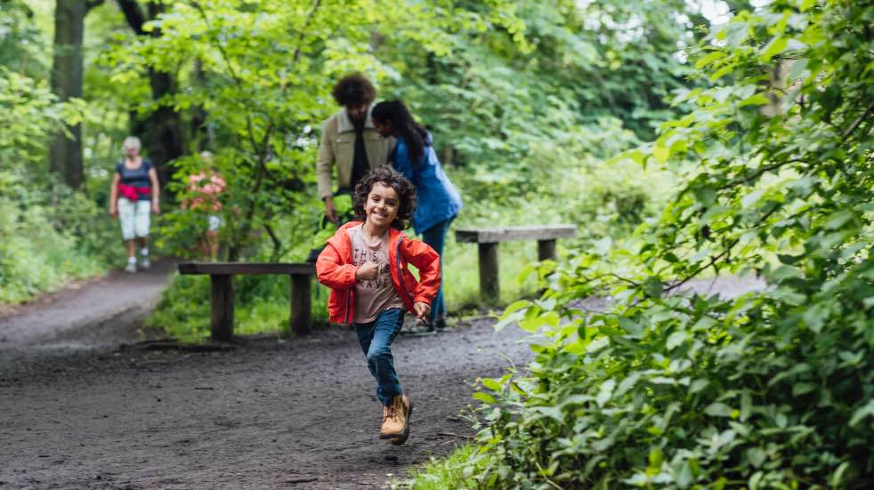 Happy child running in park